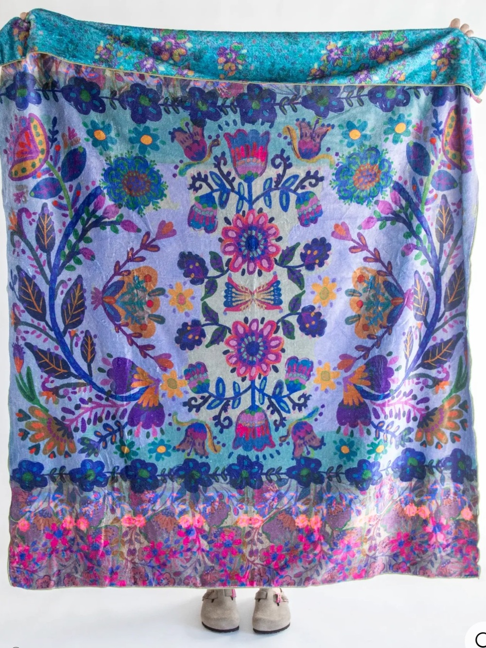 Natural Life features a vibrant Border Folk Garden floral pattern
